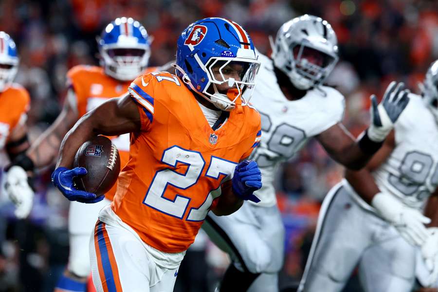 Broncos RB J.K. Dobbins runs with the ball against the Las Vegas Raiders (2025) Broncos RB J.K. Dobbins runs with the ball against the Las Vegas Raiders (2025)