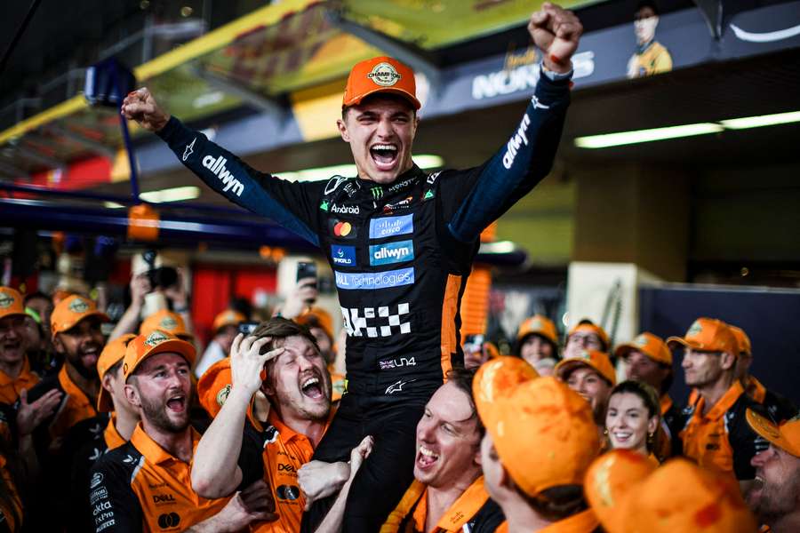 McLaren's Lando Norris celebrates becoming Formula 1 world champion after the Abu Dhabi Grand Prix