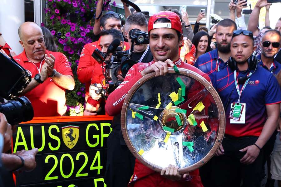 Carlos Sainz with the winner's trophy at the Australian Grand Prix