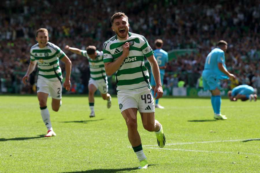 Celtic winger James Forrest celebrates scoring for a 16th consecutive season