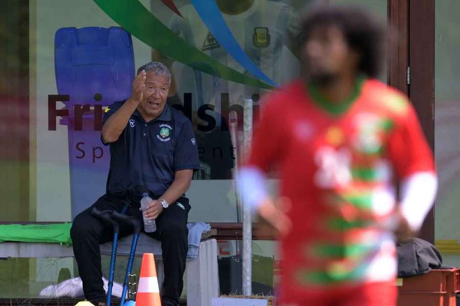 Suriname manager Henk ten Cate coaches his team as an assistant manager during a training session in 2023