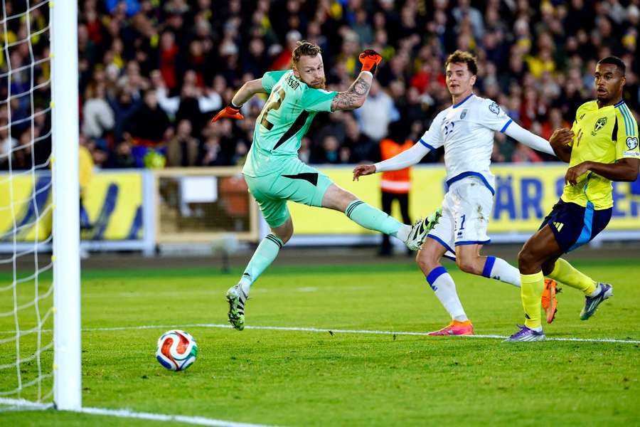 Fisnik Asllani scores the winner for Kosovo