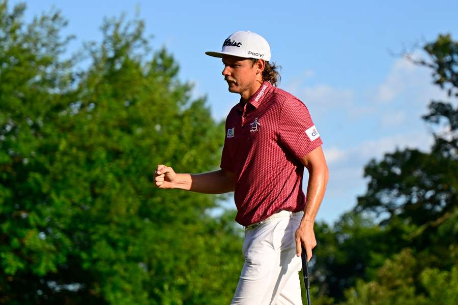 Cameron Smith reacts after winning the LIV Golf Invitational title at Sugar Grove, Illinois.