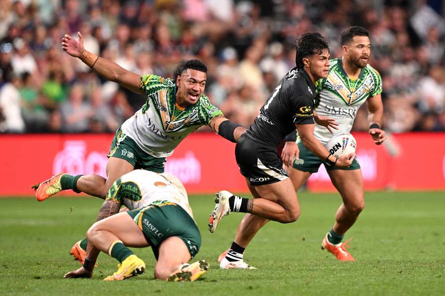 Keano Kini charging forward for New Zealand against Cook Islands at the Rugby League World Cup. Keano Kini charging forward for New Zealand against Cook Islands at the Rugby League World Cup.