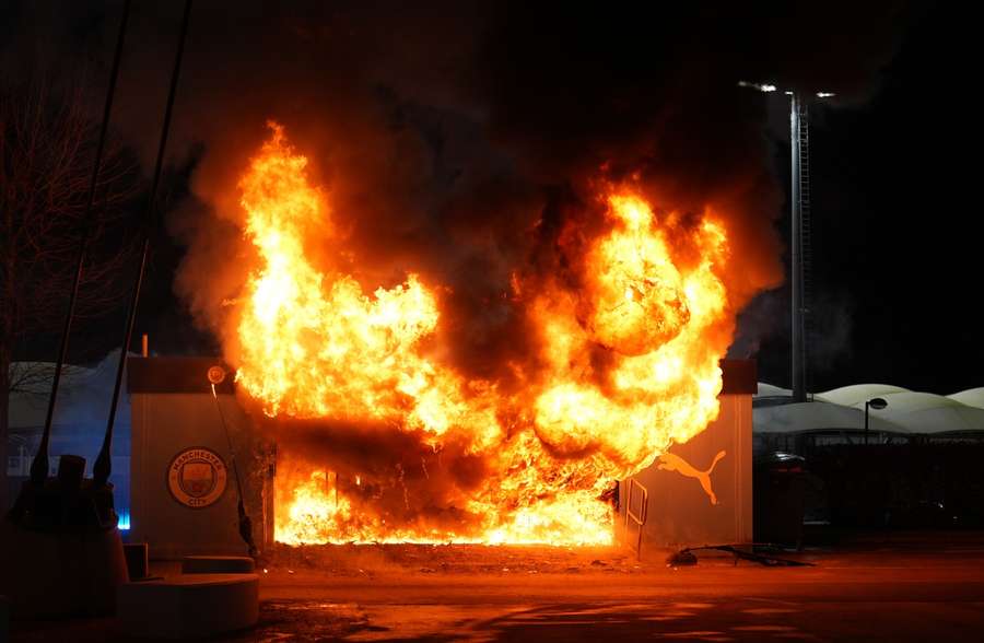 A merchandise kiosk is ablaze prior to Man City's crucial Champions League match A merchandise kiosk is ablaze prior to Man City's crucial Champions League match