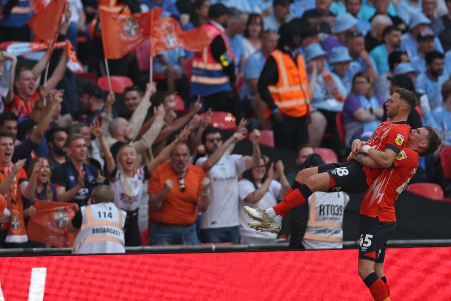 Jordan Clark celebrates after giving Luton the lead