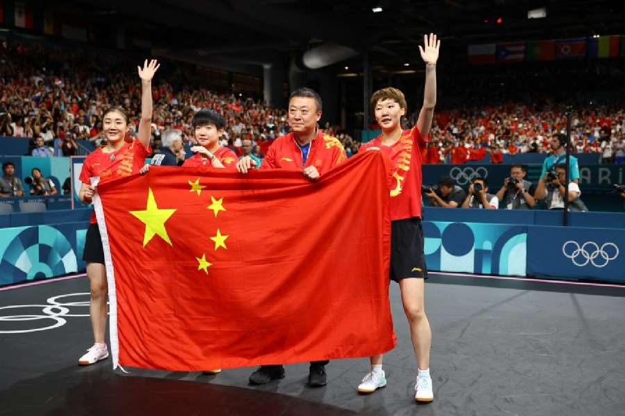 China celebrate their win