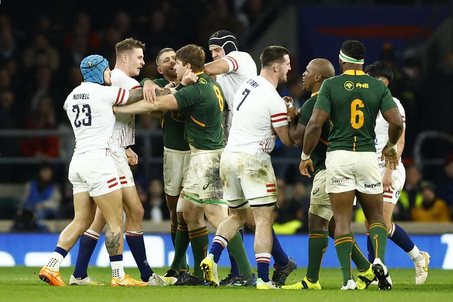 England and South Africa grabbing each other at World Cup