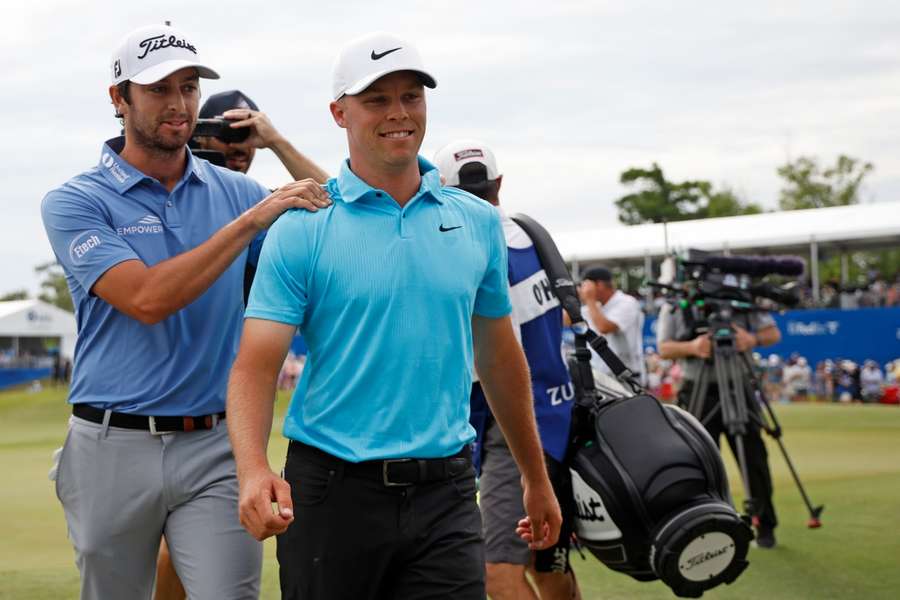 Riley (L) and Hardy react to their win