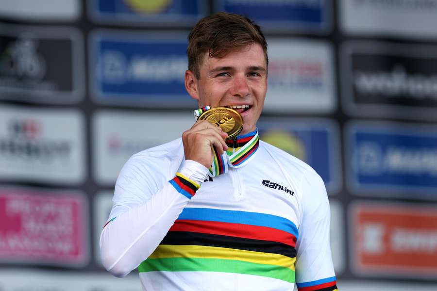 Belgium's Remco Evenepoel celebrates winning the men's Individual Time Trial