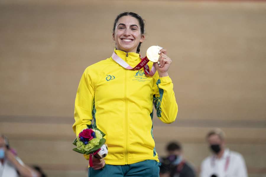 Paige Greco poses with a medal won at the 2020 Tokyo Paralympics.