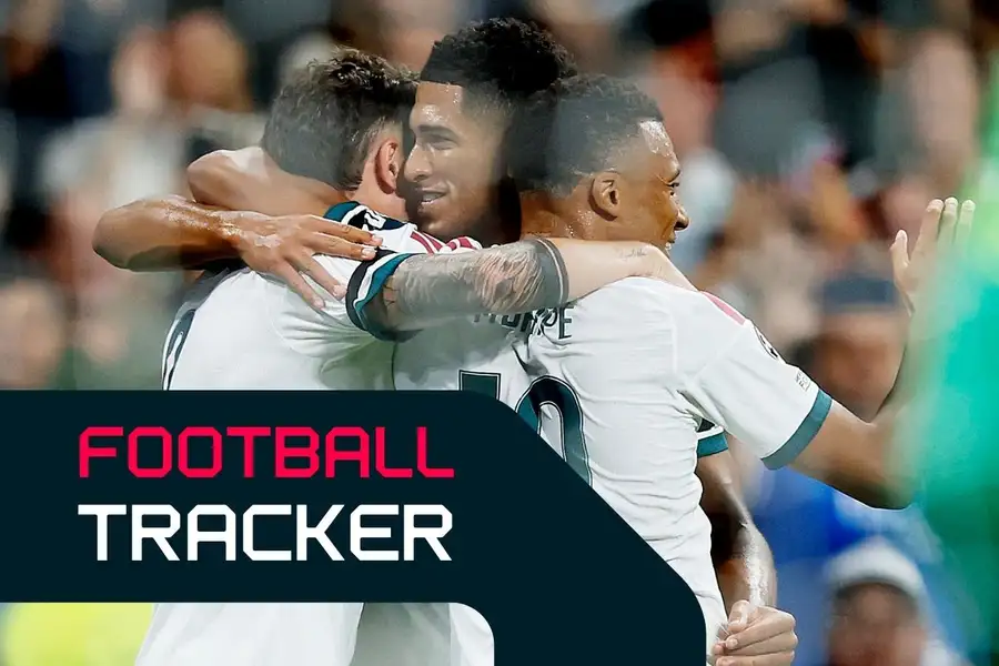 Jude Bellingham embraces Real Madrid goalscorers Fede Valverde and Kylian Mbappe
