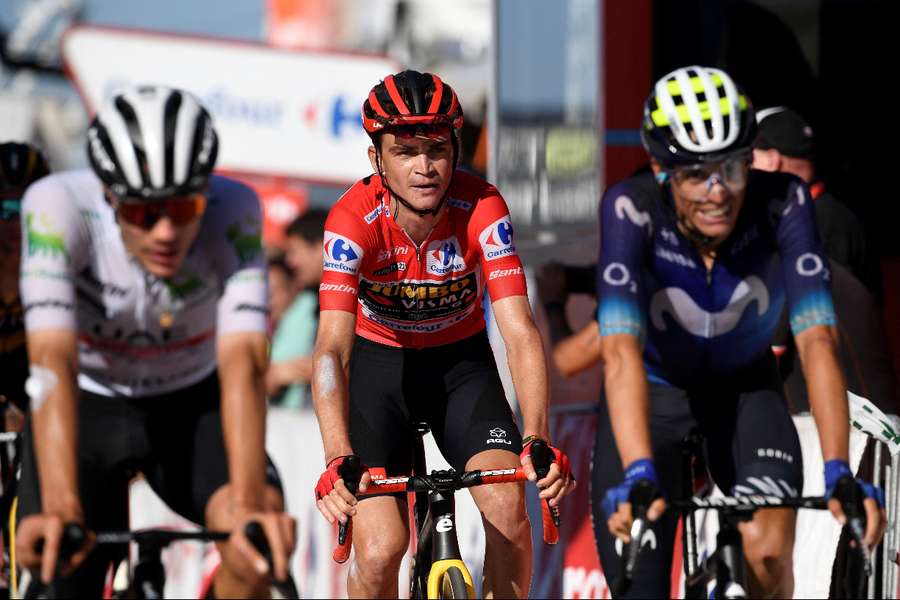Jumbo-Visma's US rider Sepp Kuss (C) kept his red jersey and now seems poised to win the Vuelta a Espana