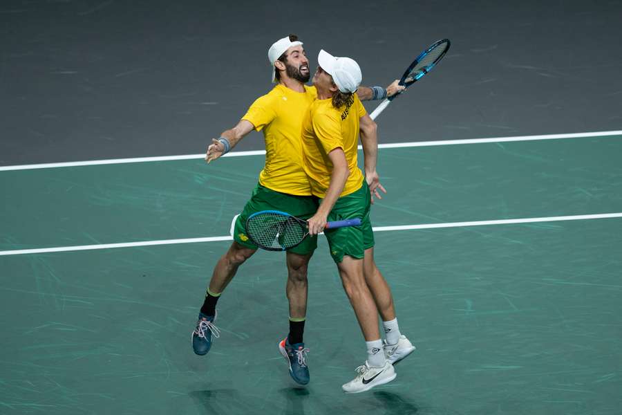 Jordan Thompson (L) and Max Purcell celebrate victory