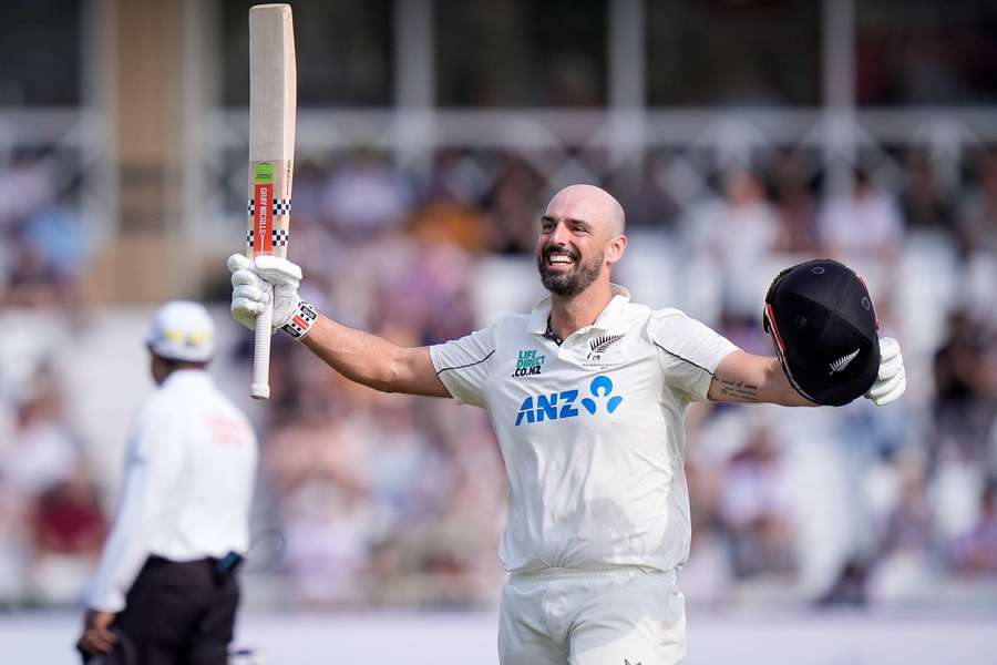 Mitchell celebrates his century