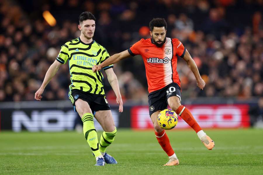Arsenal's Declan Rice and Luton's Andros Townsend in action