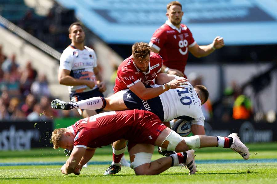 Sale Sharks' Jean Luc du Preez in action with Saracens' Owen Farrell