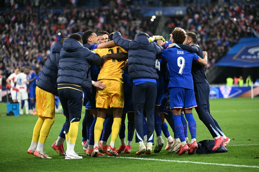 France celebrate their penalty shootout win