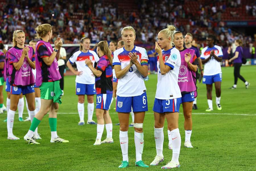 England players look dejected after the game