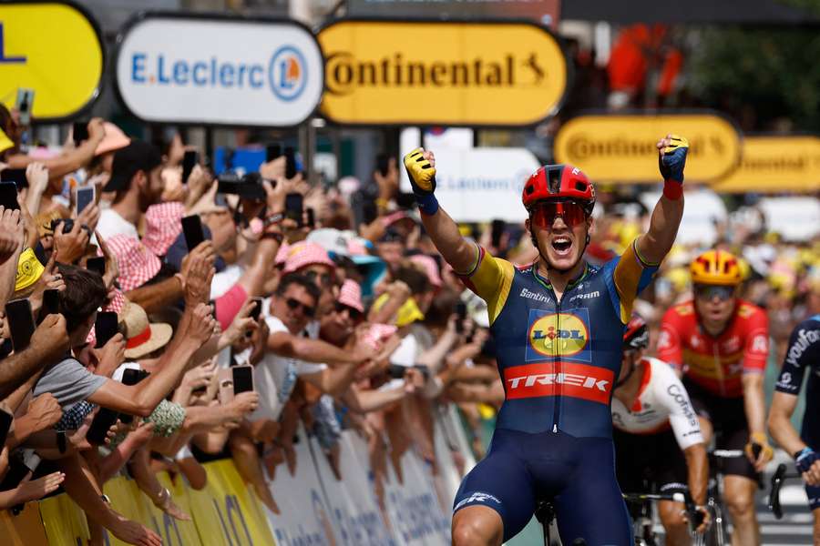 Stage winner Mads Pedersen celebrates his victory