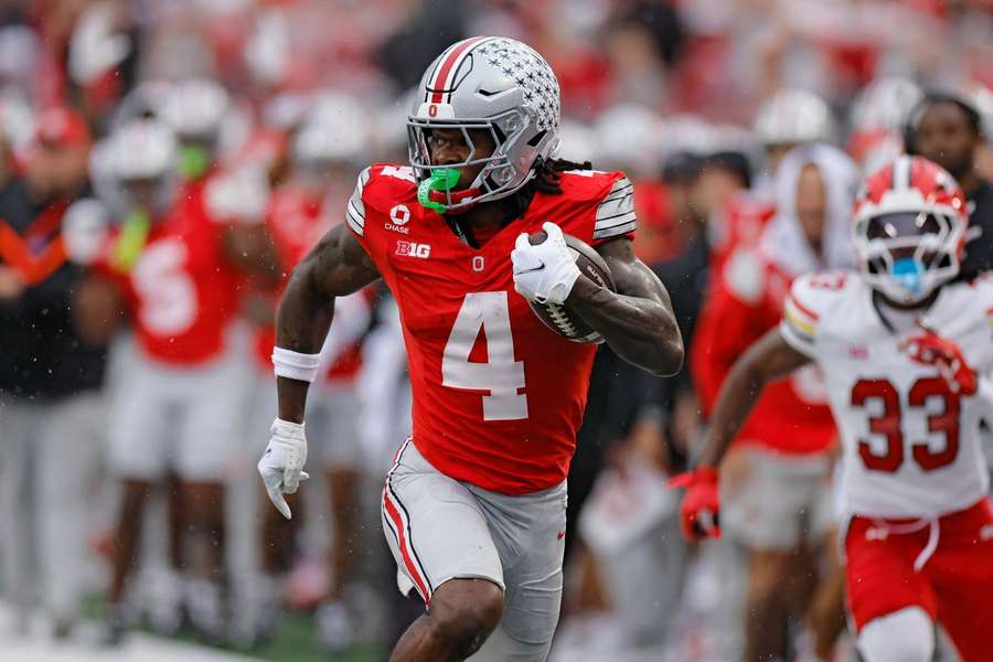 Ohio State's wide receiver Jeremiah Smith runs with the football against Maryland Ohio State's wide receiver Jeremiah Smith runs with the football against Maryland