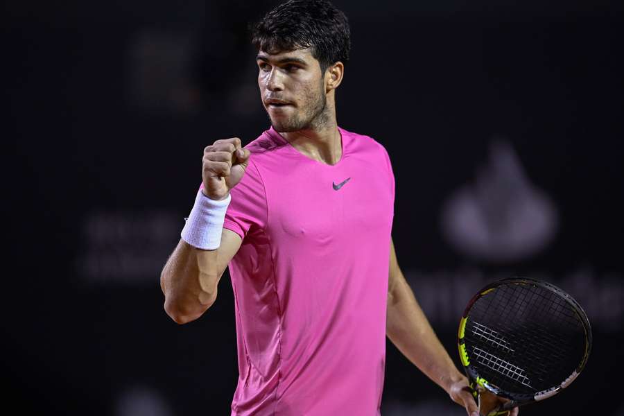 Carlos Alcaraz celebrates a point