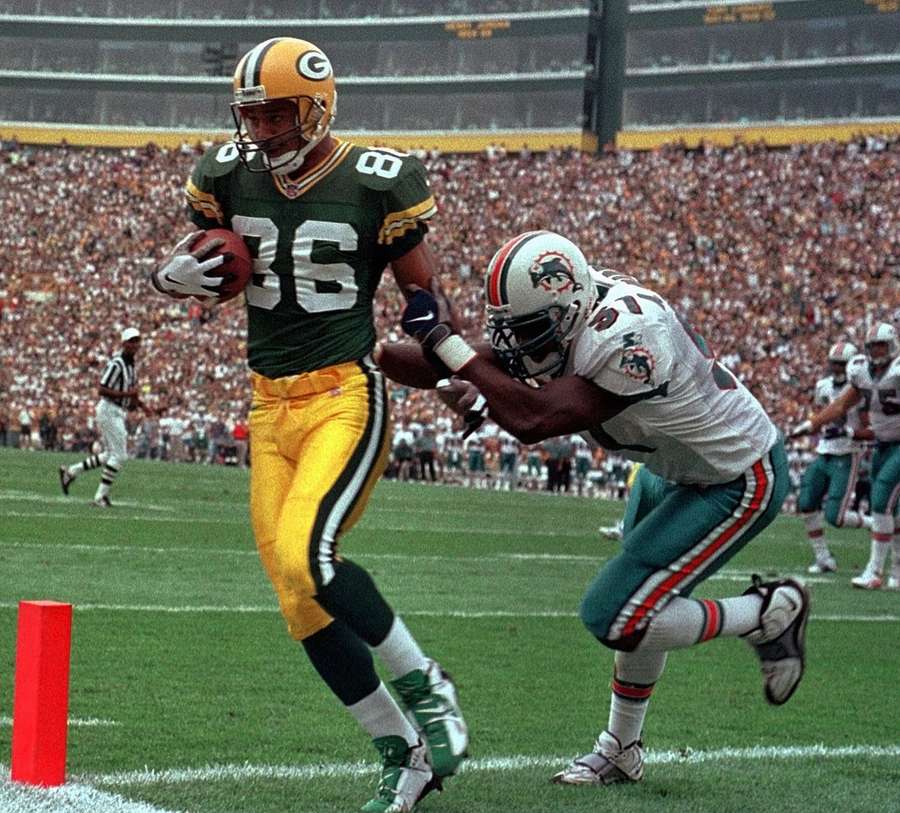 Green Bay Packers receiver Antonio Freeman catches a touchdown pass in front of Miami Dolphins Anthony Harris during the Super Bowl in 1997 Green Bay Packers receiver Antonio Freeman catches a touchdown pass in front of Miami Dolphins Anthony Harris during the Super Bowl in 1997