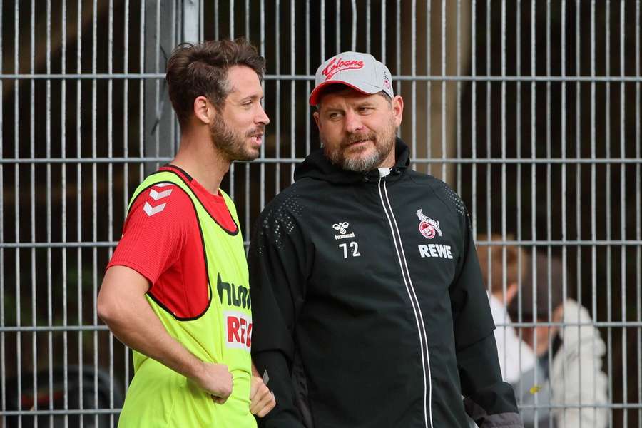 Uth (li.) mit Köln-Trainer Steffen Baumgart