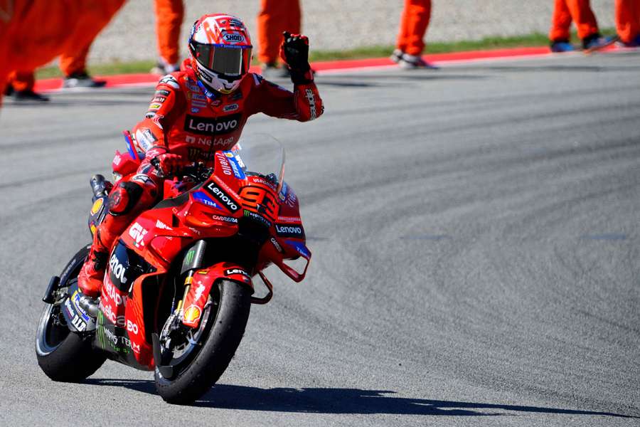 Marc Marquez celebrates winning the sprint at the Moto Grand Prix of Catalonia Marc Marquez celebrates winning the sprint at the Moto Grand Prix of Catalonia