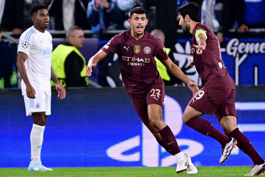 Matheus Nunes celebrates Ilkay Gundogan's goal against Slovan Bratislava in the Champions League