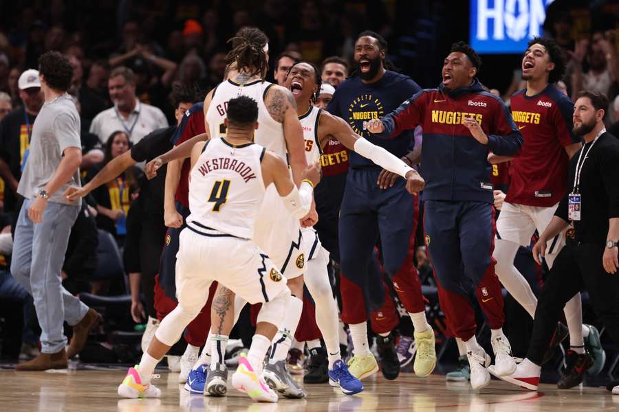 The Denver Nuggets celebrate after defeating the Oklahoma City Thunder