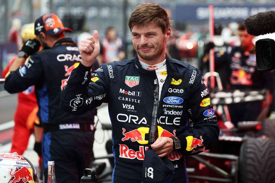 Red Bull's Max Verstappen celebrates after winning the sprint race in Singapore