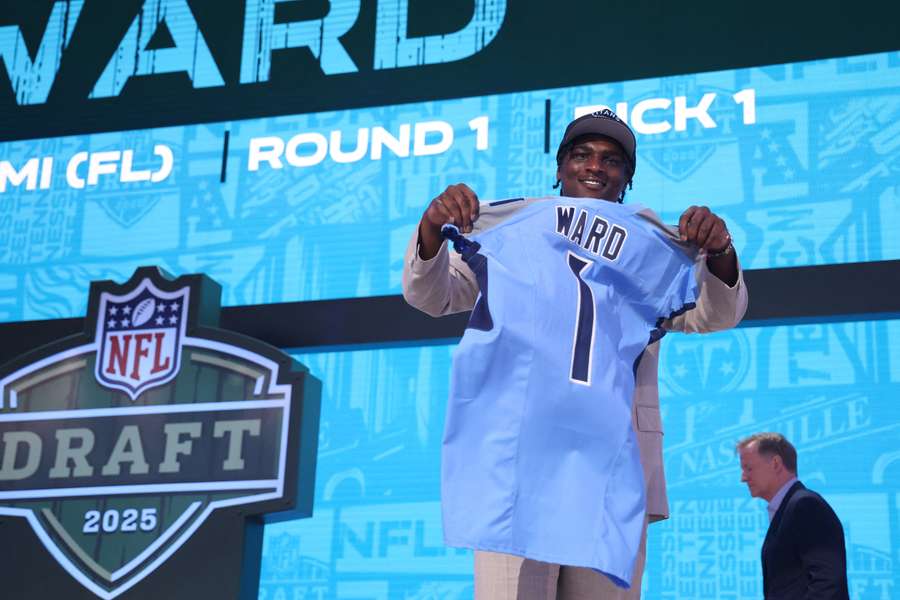 Tennessee Titans new quarterback Cam Ward poses at the 2025 NFL Draft