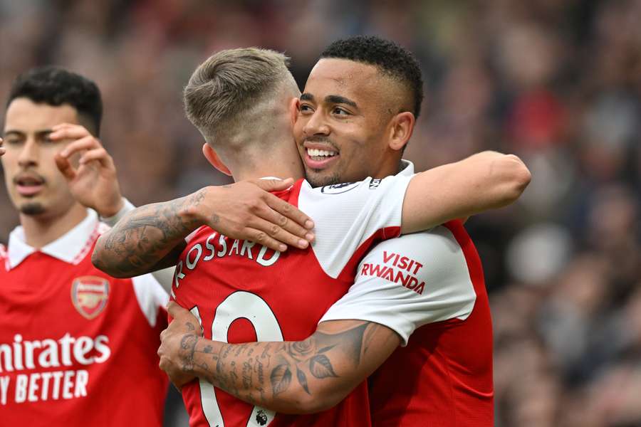 Arsenal striker Gabriel Jesus (R) celebrates with Arsenal midfielder Leandro Trossard