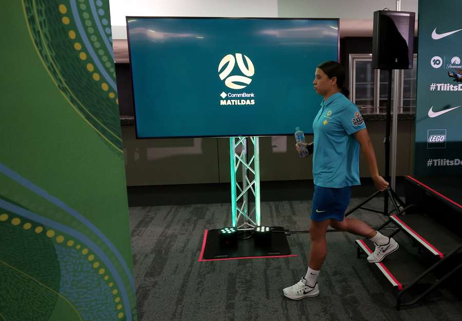 Australian forward Sam Kerr leaves a press conference at Queensland Sport and Athletics Centre in Brisbane