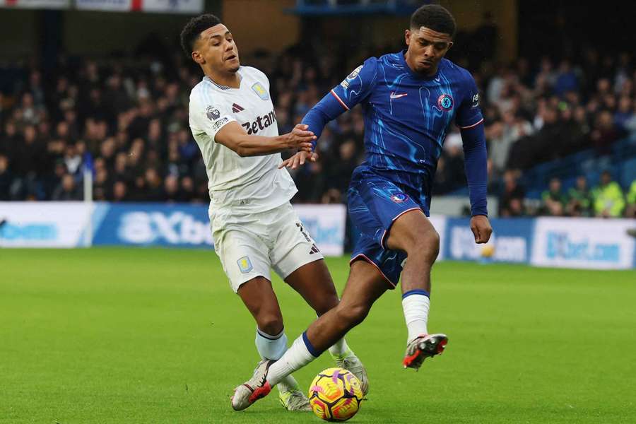 Wesley Fofana battles with Ollie Watkins during a Premier League clash