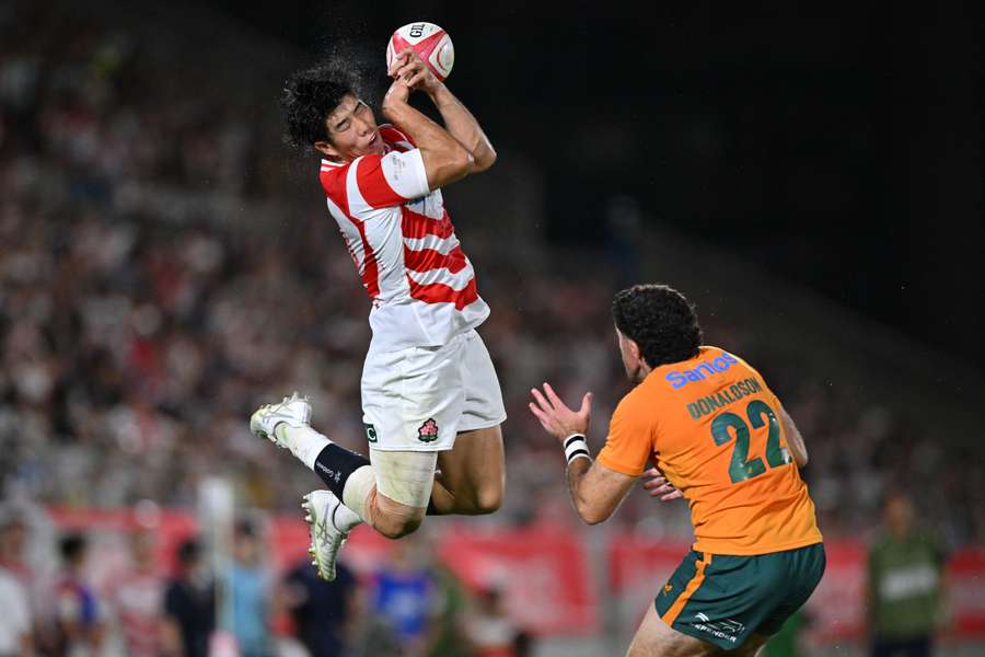Yoshitaka Yazaki attempting to catch a high ball against Australia last weekend.
