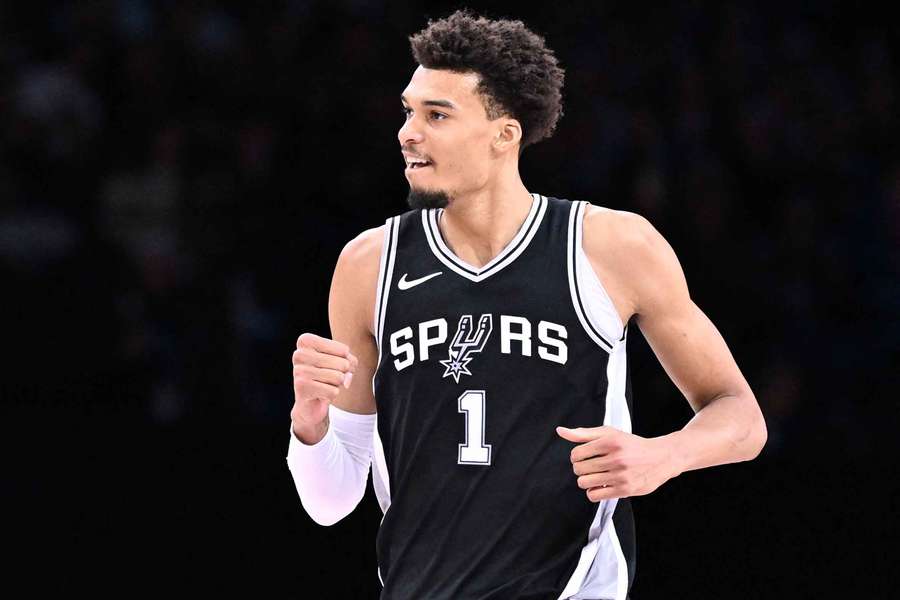 Victor Wembanyama celebrating after a made shot during the 2025 NBA Paris Games.