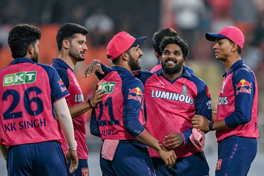 Rajasthan Royals' Wanindu Hasaranga (second right) celebrates with teammates after taking the wicket of Punjab Kings' Nehal Wadhera