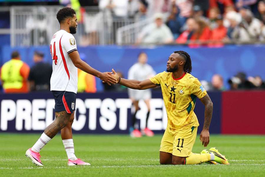 England's Reece James shakes hands with Ghana's Antoine Semenyo after the match.