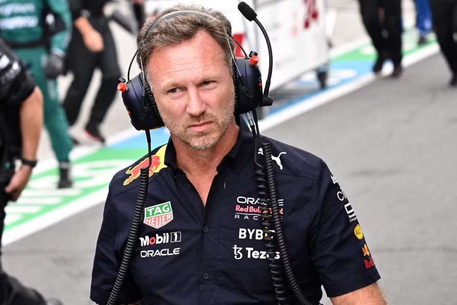 Red Bull team principal Christian Horner in the pit lane during the race pool