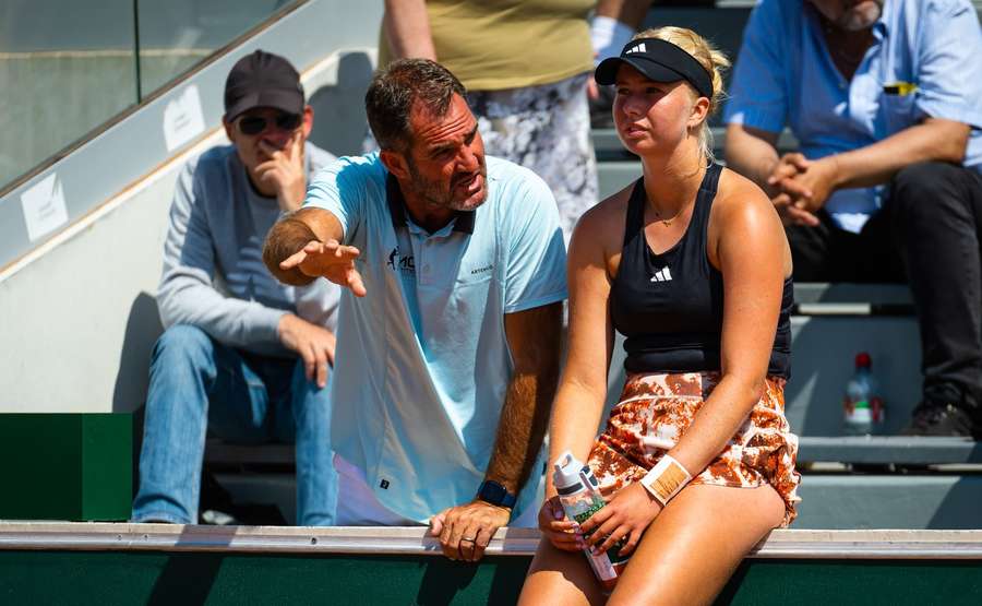 A number of Tausons's previous coaches (here Carlos Martinez) has struggled to help her