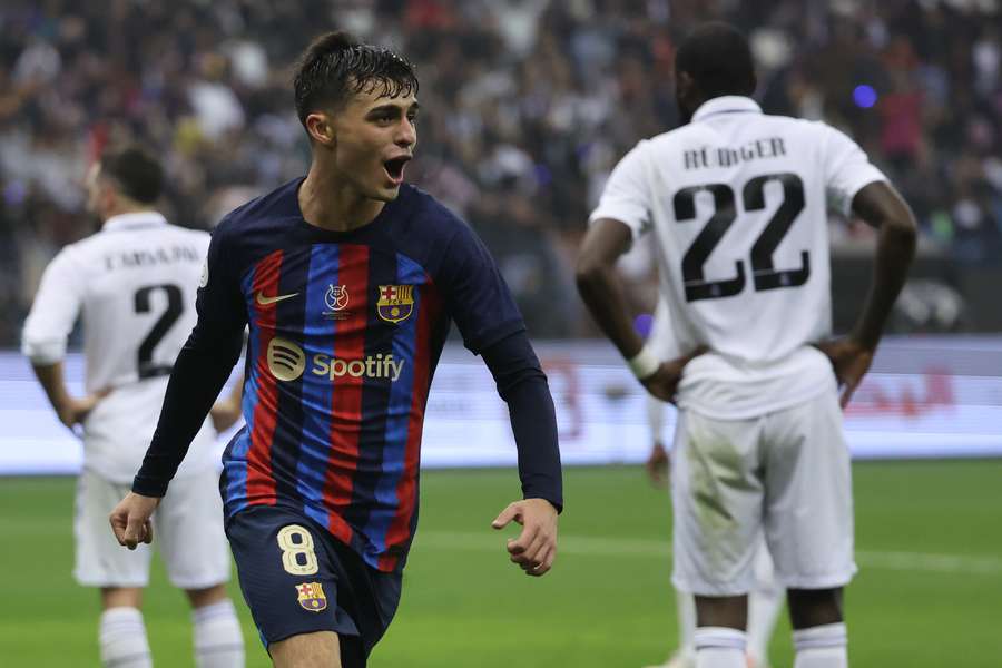 Barcelona's Spanish midfielder Pedri celebrates after scoring his team's third goal 