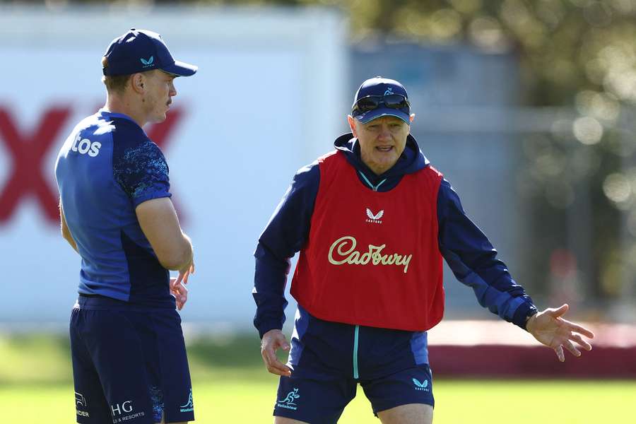 Wallabies debutant Declan Meredith talks tactics with head coach Joe Schmidt at training on Thursday. Wallabies debutant Declan Meredith talks tactics with head coach Joe Schmidt at training on Thursday.