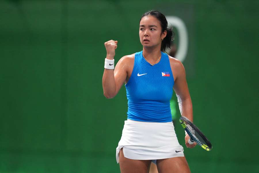 Alexandra Eala celebrates during her victory over Patcharin Cheapchandej