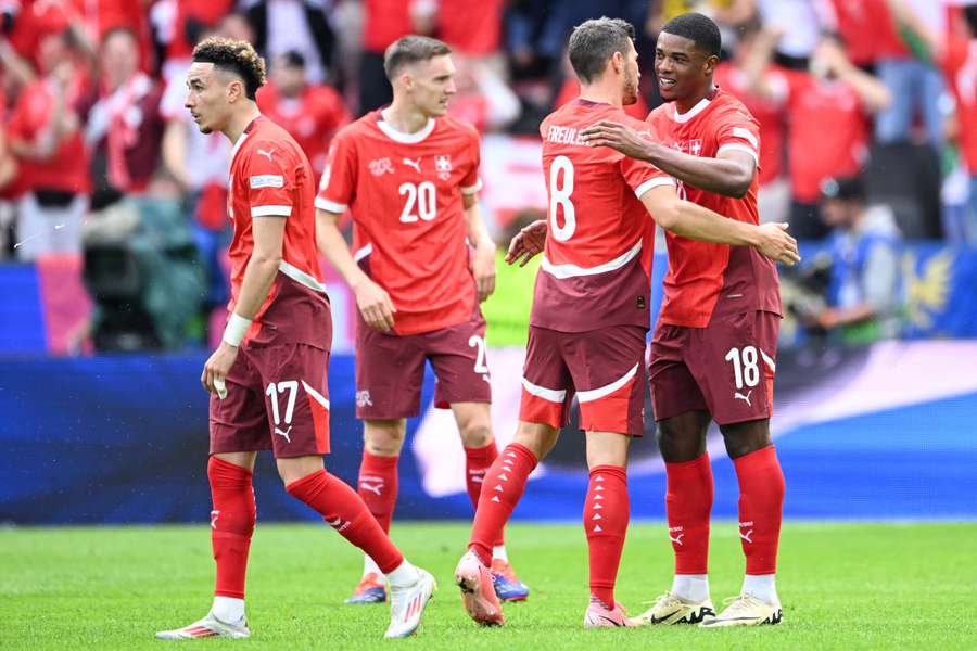 Switzerland's Kwadwo Duah celebrates scoring the opening goal with teammates