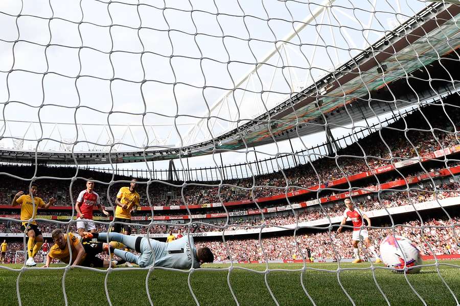 Arsenal's Swiss midfielder Granit Xhaka (back 2ndL) scores his team's second goal