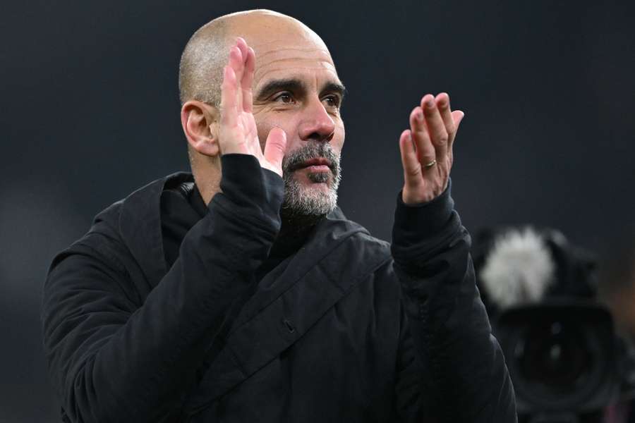 Pep Guardiola celebrates after the UEFA Champions League round of 16, first-leg football match between FC Copenhagen and Manchester City 