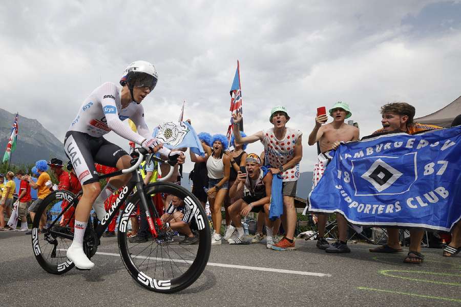 Tadej Pogacar wearing the white jersey in action during stage 16