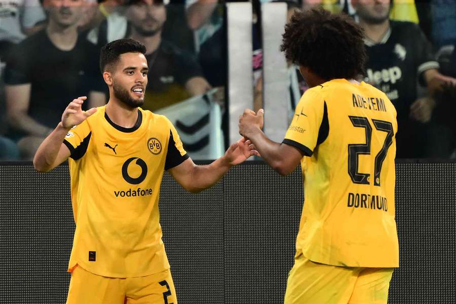 Dortmund's Brazilian defender #02 Yan Couto celebrates scoring his team's third goal